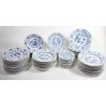 20th century Meissen dinner wares: a quantity of blue and white soup plates, side plates, bowls