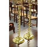 Two large brass candlesticks, of double helix form (2)