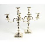A pair of silver three light candelabra of 18th century style, C J Vander, Sheffield 1999, with