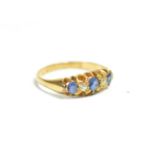 An early 20th century 18 carat gold sapphire and diamond five stone ring, finger size L1/2. Gross