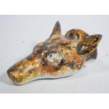 A pearlware fox mask stirrup cup, late 18th century, naturalistically modelled and decorated with