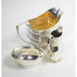 A late George III silver cream jug, crested; and an 18th century style silver morning cream and