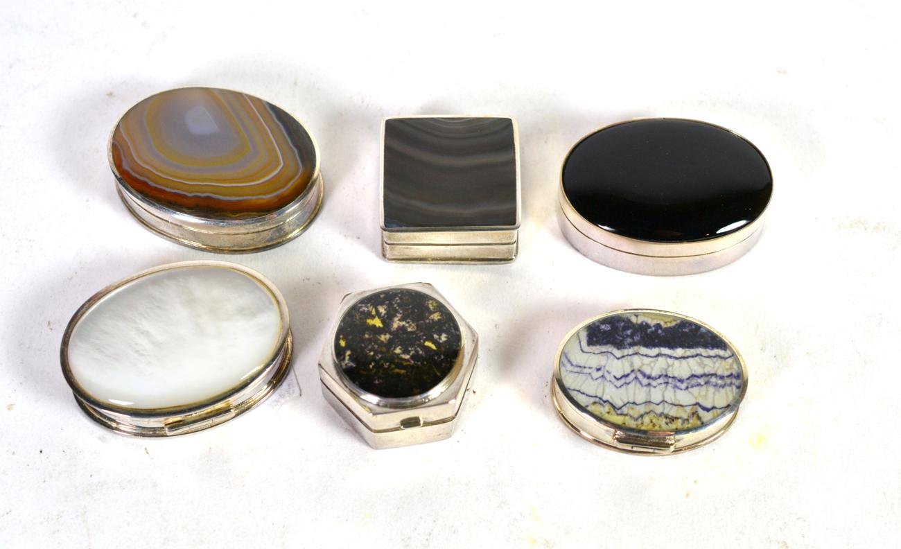 A group of six modern hardstone and mother of pearl set silver pill boxes, all with UK hallmarks,