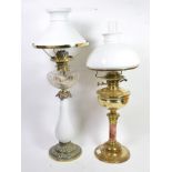 Two oil lamps, with opaque glass shades