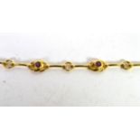 A 9 carat gold gem set bracelet, length 18.5cm . Gross weight 11.51 grams