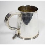 A hand worked silver mug, mark of Lt Col. The Rev William Bull (1905-1987), London 1977, plain