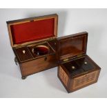 A parquetry decorated oblong tea caddy and another, mahogany and ebony lined sarcophagus tea