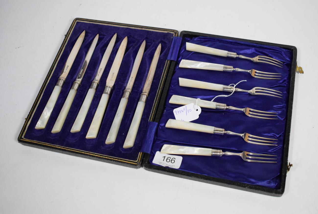 Six pairs of Edwardian silver fruit knives and forks, Allen & Darwin, Sheffield 1905, with mother of