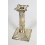 Silver candlestick with loaded base