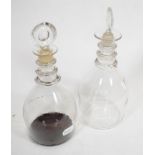 A pair of 19th century triple ring neck decanters with reeded decoration