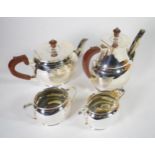 A silver four piece tea and coffee service, Roberts & Belk, Sheffield 1963, of plain oval bellied