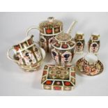 A tray of Royal Crown Derby Imari teawares; salt and pepper; ginger jar and over etc