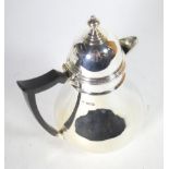 An Edwardian silver hot water jug, Thomas Bradbury & Sons, Sheffield 1909, baluster with domed cover