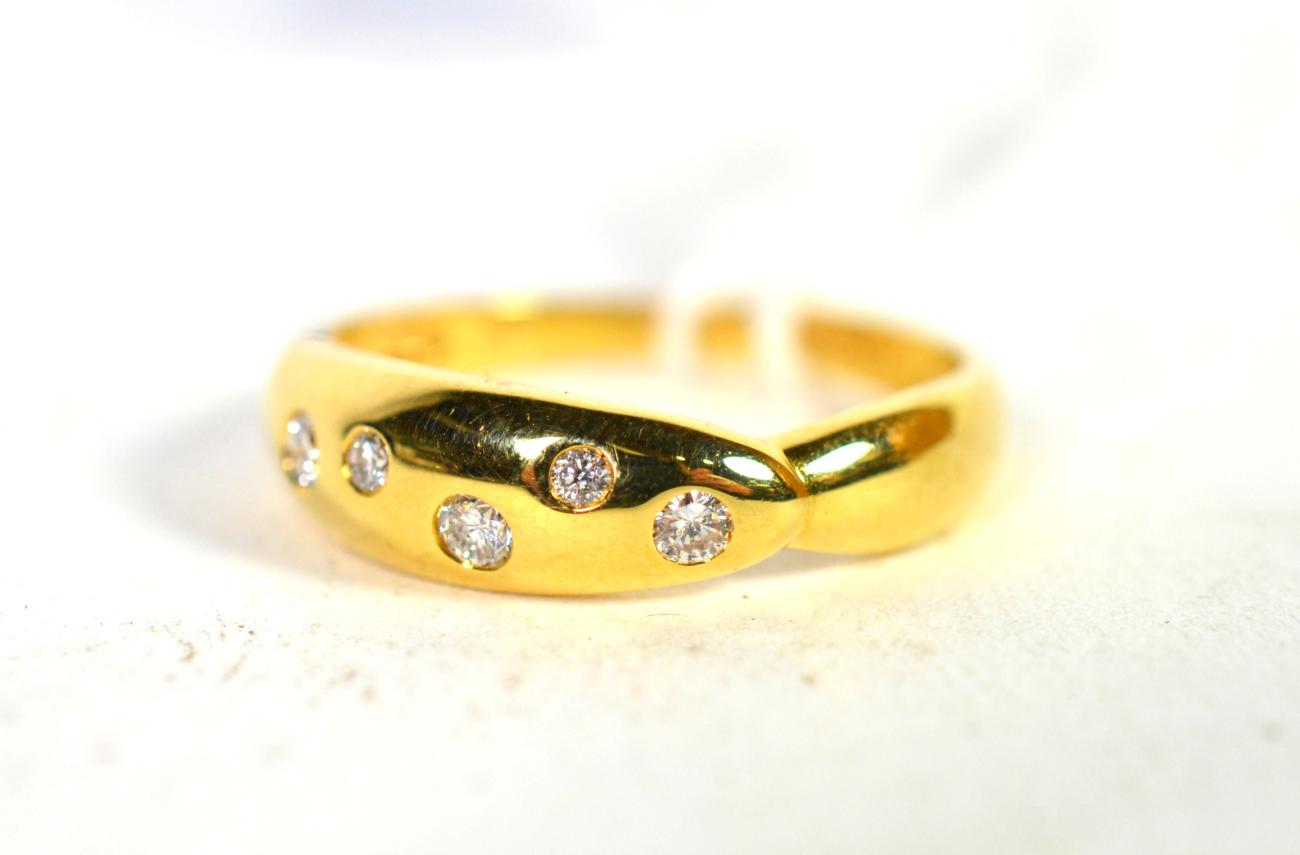 An 18 carat gold diamond set ring, finger size O. Gross weight - 2.24 grams