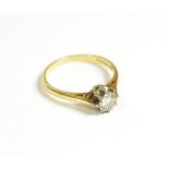 An 18 carat gold solitaire diamond ring, finger size L1/2. Gross weight - 2.4g