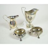 A George III silver pedestal cream jug, makers mark TL, Sheffield 1802; a pair of Victorian salts of