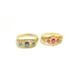 An 18 carat gold sapphire and diamond ring (one diamond missing), finger size N; and a ruby and