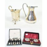 A pair of Victorian silver salts and spoons, Birmingham 1894, in a fitted case; a set of six