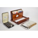 A set of sterling silver Bridge propelling pencils, cased; with a silver cigar case and box of