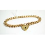 A 9 carat gold bracelet, each link stamped '9' '.375', with later 9 carat gold padlock clasp, length