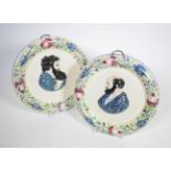 A pair of Portobello pottery wall plaques, circa 1820, moulded in relief and painted with bust