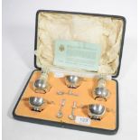 An eight piece silver cased condiment set, Brook & Son