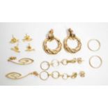 Three pairs of 9 carat gold drop earrings; a pair of hoop earrings; and two pairs of 18 carat gold