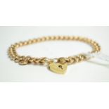 A 9 carat gold bracelet, each link stamped '9' '.375', with later 9 carat gold padlock clasp, length