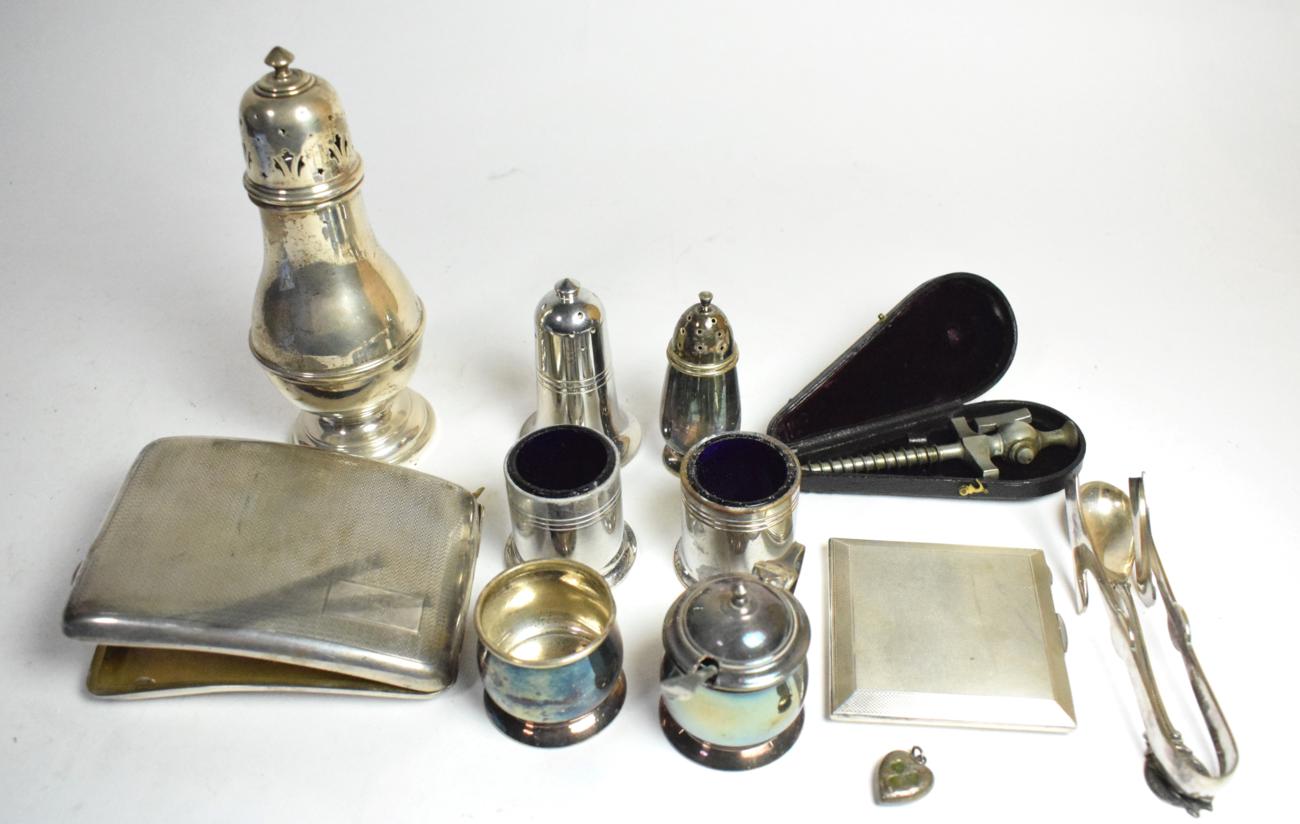A silver cigarette case; a sugar caster; a compact; a spoon and locket; together with a small lot of