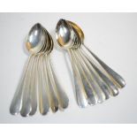 A set of twelve Austrian silver dessert spoons, Vienna, post 1921, 800 standard, 15.5cm long, 10.