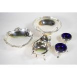 A group of silver items, comprising: a pair of George III circular silver salts, makers mark IS