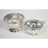 A silver twin handled bowl, Z Barraclough & Sons, London 1946, with foliate capped scroll handles;