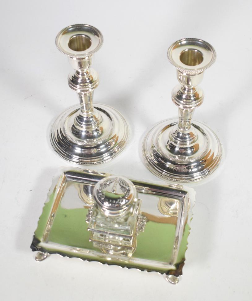 A pair of silver candlesticks, London 2000, with bead borders; and a a late Victorian silver