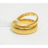 Two 22 carat gold band rings, finger size K and N1/2 (2). Gross weight - 9.8g gross