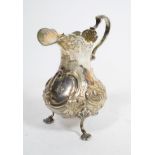 A Victorian silver cream jug of 18th century style, Thomas Hughes Headland, London 1854, baluster