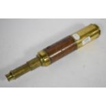 A leather covered and brass telescope signed ''Dolland London, Day or Night''
