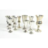 A group of eleven various silver Kiddish cups, various dates and makers, the largest 12.5cm high,