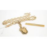 A 9 carat gold part watch chain and fob; and a tie pin, stamped '9ct' (2). Gross weight - 25g
