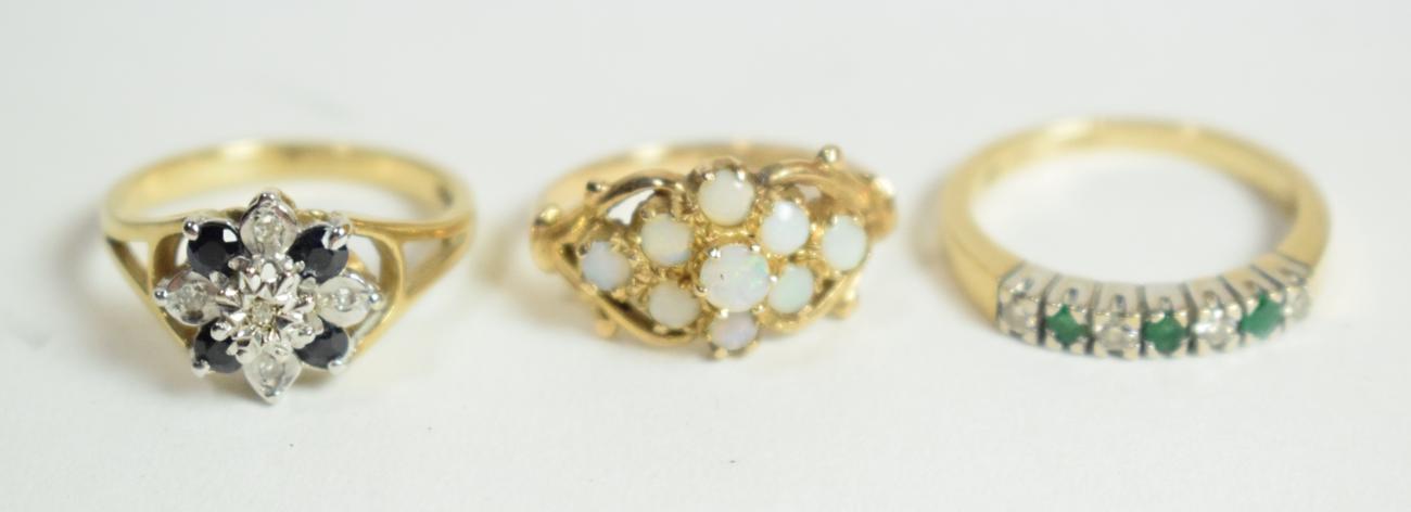 Three 9 carat gold gem set dress rings, finger sizes K1/2, N and N (3). Gross weight - 8.48 grams.