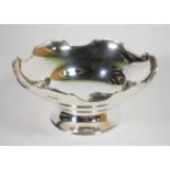 A silver pedestal bowl, James Deakin & Sons, Sheffield 1932, circular with shaped rim,
