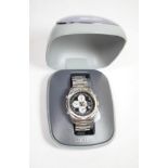 A stainless steel chronograph calendar alarm wristwatch, signed Seiko , with Seiko box and booklets