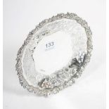 A pierced silver pedestal dish, Walker & Hall, Sheffield 1935, with fruiting vine rim and a wide