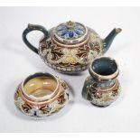 A silver mounted Doulton Lambeth stoneware three piece teaset