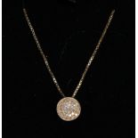 A diamond pendant, on 9 carat chain, pendant 1cm diameter, chain length 40cm. Gross weight - 3.45