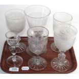 Two pairs of wine glasses and two other glasses