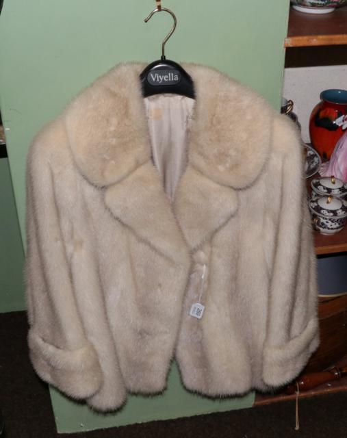 Blond mink jacket with deep cuffs and back belt, the interior labelled for Rodgers of