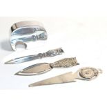 A Georg Jenson bottle opener, two owl book marks and another (4)