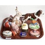 Four Royal Crown Derby paperweights, a Royal Doulton model of a dog, Herend porcelain model of a