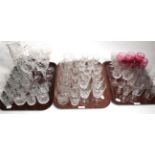 A quantity of assorted crystal, engraved glasses, ruby tinted glass etc (three trays)