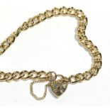 A 9 carat gold bracelet, with attached lock stamped '375', length 18cm . Gross weight - 16.35 grams